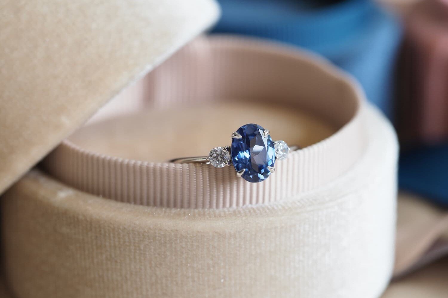Oval blue sapphire ring kept in velvet box