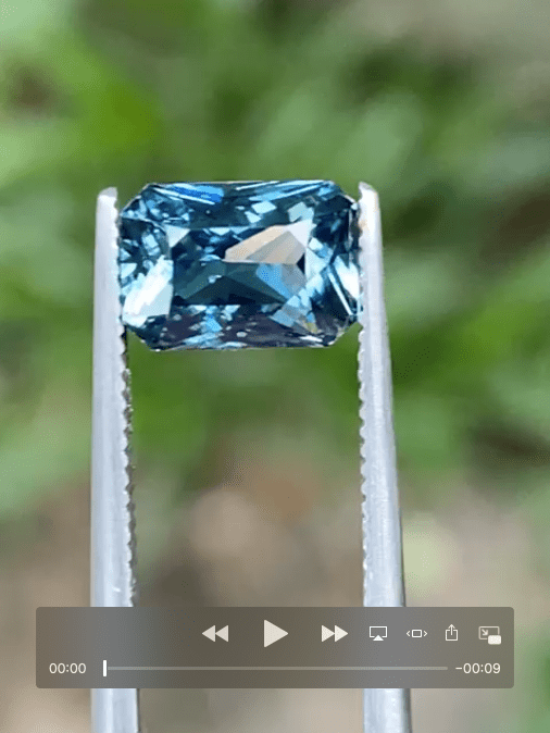 Teal Sapphire engagement ring - stone video grab