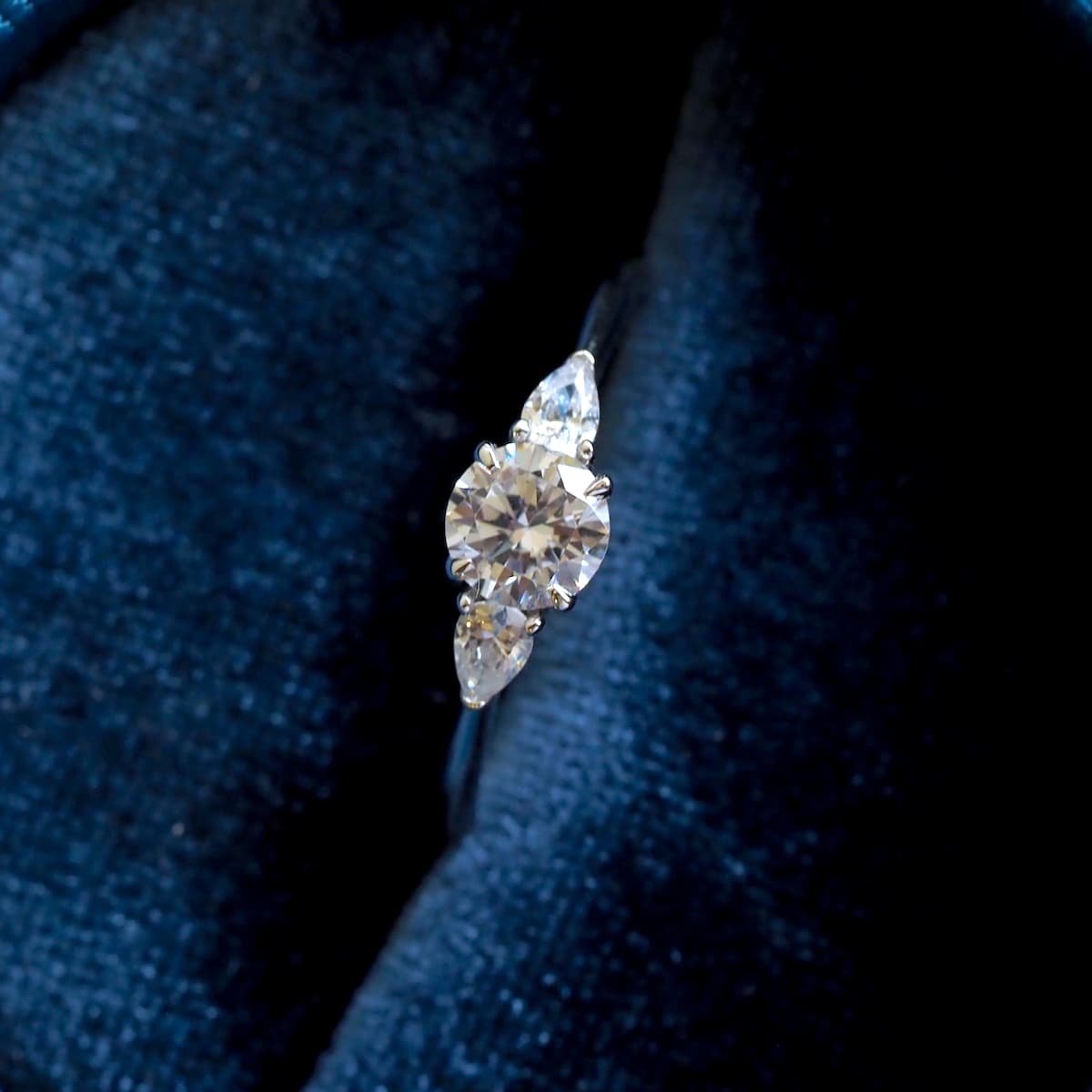 Jude solitaire with pear diamonds