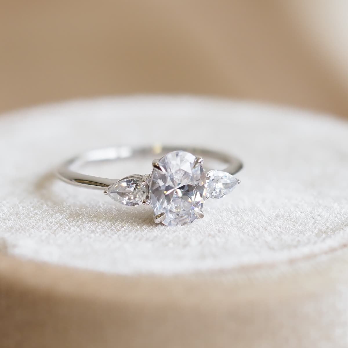 Lisa Diamond ring with pear side diamonds
